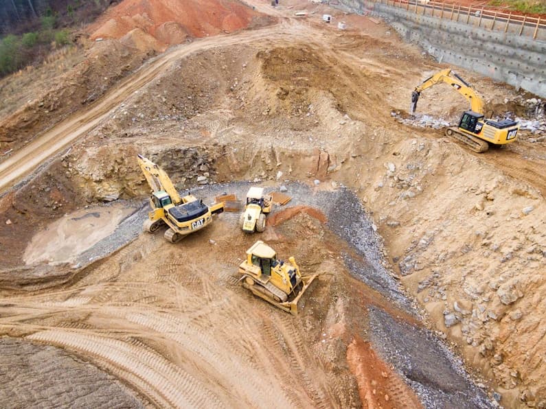 Heavy excavation machinery at ground site